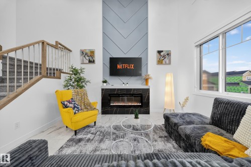 3605 41 Ave, Beaumont, AB - Indoor Photo Showing Living Room With Fireplace