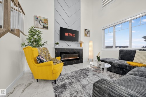 3605 41 Ave, Beaumont, AB - Indoor Photo Showing Living Room With Fireplace