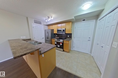 302 6921 199 Street, Edmonton, AB - Indoor Photo Showing Kitchen With Double Sink
