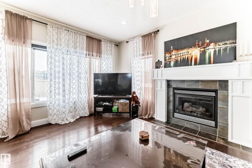 6159 12 Avenue Sw, Edmonton, AB - Indoor Photo Showing Living Room With Fireplace