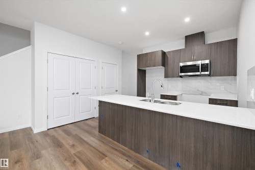 9107 Elves Loop, Edmonton, AB - Indoor Photo Showing Kitchen With Double Sink
