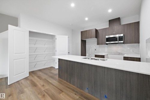 9107 Elves Loop, Edmonton, AB - Indoor Photo Showing Kitchen With Double Sink