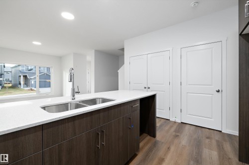 9107 Elves Loop, Edmonton, AB - Indoor Photo Showing Kitchen With Double Sink