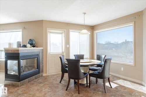 1969 Garnett Way, Edmonton, AB - Indoor Photo Showing Dining Room With Fireplace