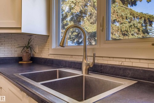 157 Brookwood Drive, Spruce Grove, AB - Indoor Photo Showing Kitchen With Double Sink
