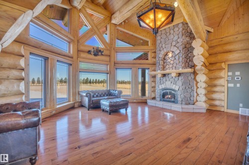 49169 Rge Rd 260, Rural Leduc County, AB - Indoor Photo Showing Living Room With Fireplace