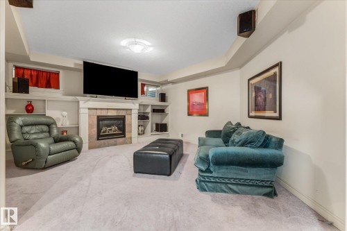 813 Proctor Wynd, Edmonton, AB - Indoor Photo Showing Other Room With Fireplace