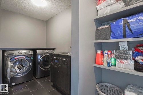 1116 Hainstock Green Green, Edmonton, AB - Indoor Photo Showing Laundry Room