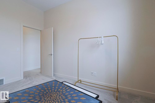 1116 Hainstock Green Green, Edmonton, AB - Indoor Photo Showing Other Room