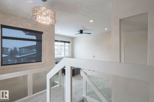 1116 Hainstock Green Green, Edmonton, AB - Indoor Photo Showing Other Room