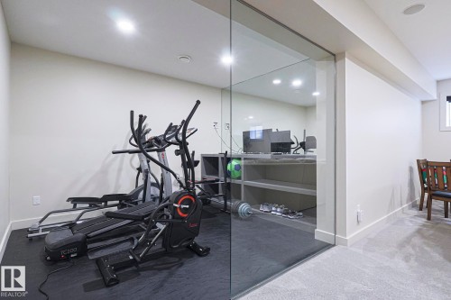 1116 Hainstock Green Green, Edmonton, AB - Indoor Photo Showing Gym Room