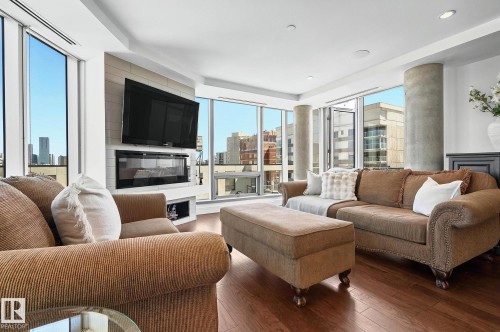 1201 11969 Jasper Avenue, Edmonton, AB - Indoor Photo Showing Living Room With Fireplace