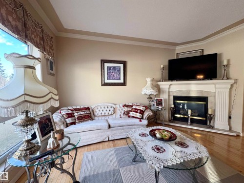 15 17603 99 Street, Edmonton, AB - Indoor Photo Showing Living Room With Fireplace