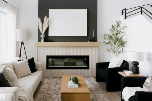 8963 Elves Loop, Edmonton, AB - Indoor Photo Showing Living Room With Fireplace