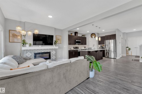 252 39 Avenue, Edmonton, AB - Indoor Photo Showing Other Room With Fireplace