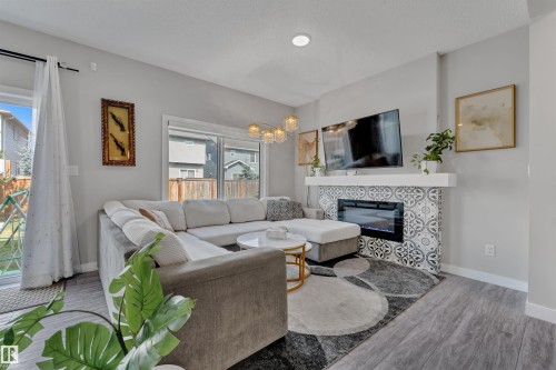 252 39 Avenue, Edmonton, AB - Indoor Photo Showing Living Room With Fireplace