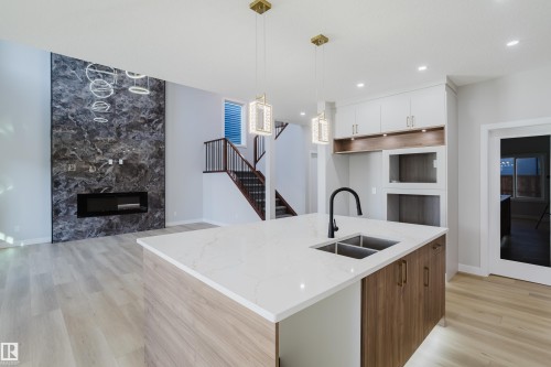 15108 14 Street, Edmonton, AB - Indoor Photo Showing Kitchen With Fireplace With Double Sink With Upgraded Kitchen