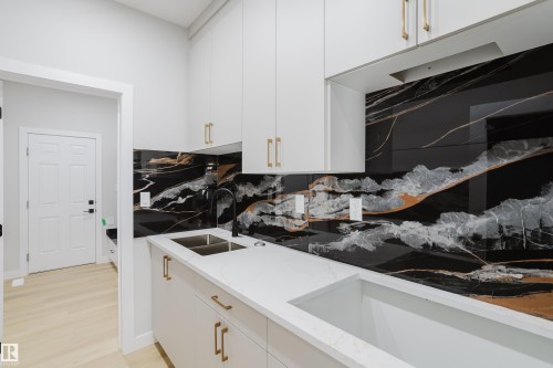 15108 14 Street, Edmonton, AB - Indoor Photo Showing Kitchen With Double Sink