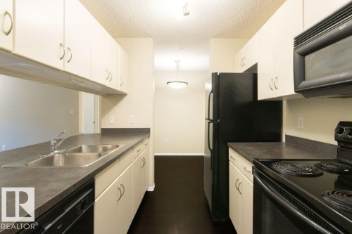239 279 Suder Greens Drive, Edmonton, AB - Indoor Photo Showing Kitchen With Double Sink