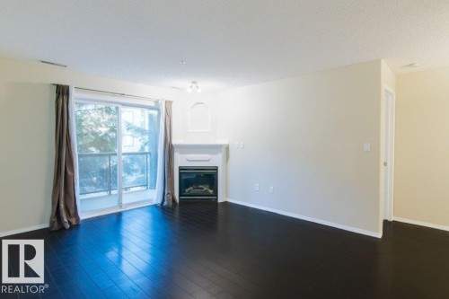239 279 Suder Greens Drive, Edmonton, AB - Indoor Photo Showing Living Room With Fireplace