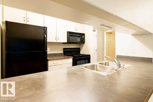 239 279 Suder Greens Drive, Edmonton, AB - Indoor Photo Showing Kitchen With Double Sink