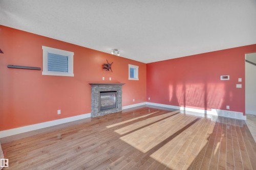 29 Southbridge Crescent, Calmar, AB - Indoor With Fireplace
