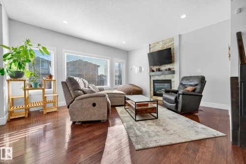 1 Wembley, Fort Saskatchewan, AB - Indoor Photo Showing Living Room With Fireplace