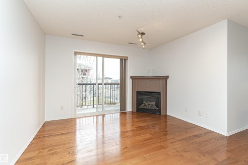 302 17407 99 Avenue, Edmonton, AB - Indoor With Fireplace