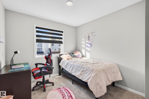 7 Emerald Way E, Spruce Grove, AB - Indoor Photo Showing Bedroom
