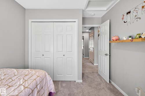 7 Emerald Way E, Spruce Grove, AB - Indoor Photo Showing Bedroom