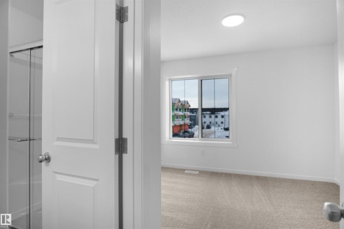 124 1009 Cy Becker Road, Edmonton, AB - Indoor Photo Showing Other Room