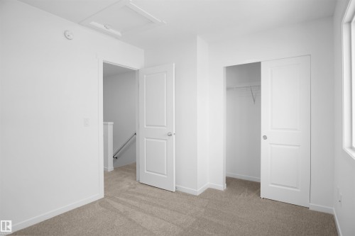 124 1009 Cy Becker Road, Edmonton, AB - Indoor Photo Showing Other Room