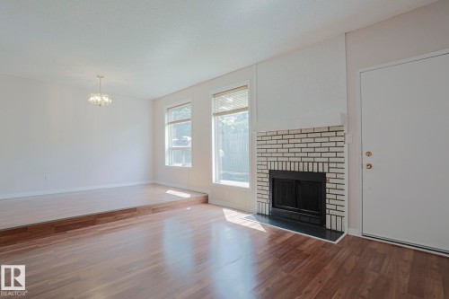 606 Saddleback Road, Edmonton, AB - Indoor Photo Showing Living Room With Fireplace