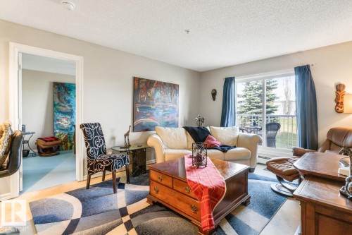 115 2208 44 Avenue, Edmonton, AB - Indoor Photo Showing Living Room