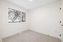 Empty room with baseboards and light carpet - 