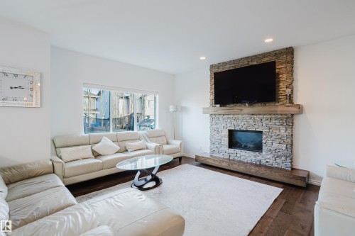 17539 61 Street, Edmonton, AB - Indoor Photo Showing Living Room With Fireplace