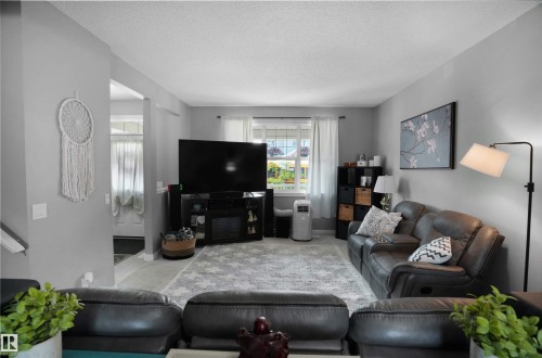 5050 Andison Close, Edmonton, AB - Indoor Photo Showing Living Room