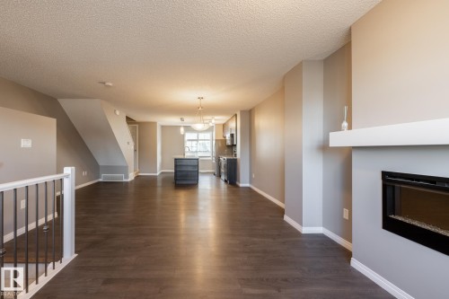 9157 Shaw Way, Edmonton, AB - Indoor Photo Showing Living Room With Fireplace
