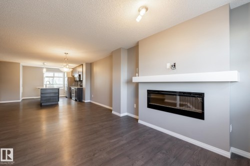 9157 Shaw Way, Edmonton, AB - Indoor Photo Showing Living Room With Fireplace