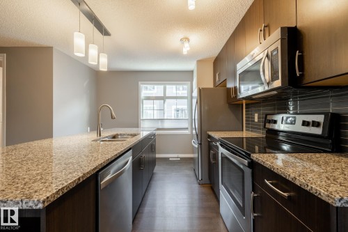9157 Shaw Way, Edmonton, AB - Indoor Photo Showing Kitchen With Stainless Steel Kitchen With Double Sink With Upgraded Kitchen