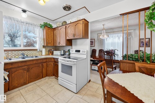 5607 97 Avenue, Edmonton, AB - Indoor Photo Showing Kitchen With Double Sink