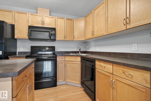 310 646 Mcallister Loop, Edmonton, AB - Indoor Photo Showing Kitchen With Double Sink