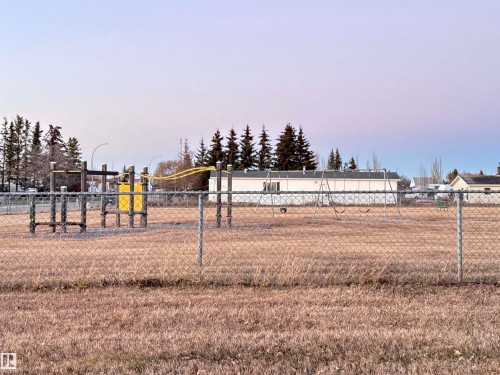 View of yard at dusk - 4748 50 St., Vimy, AB - Outdoor