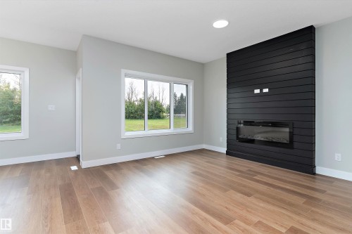 5020 50 Street, Calmar, AB - Indoor Photo Showing Living Room With Fireplace