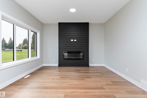 5020 50 Street, Calmar, AB - Indoor With Fireplace