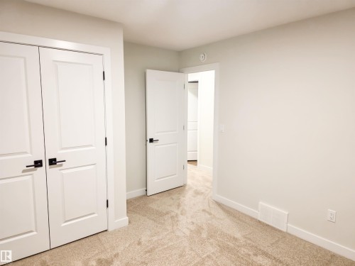 6 Elis Link, Spruce Grove, AB - Indoor Photo Showing Other Room