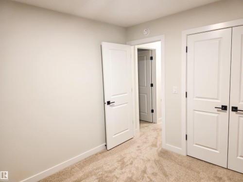 6 Elis Link, Spruce Grove, AB - Indoor Photo Showing Other Room