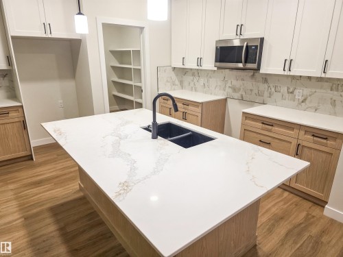 6 Elis Link, Spruce Grove, AB - Indoor Photo Showing Kitchen With Double Sink