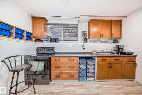 6807 Delwood Road, Edmonton, AB - Indoor Photo Showing Kitchen With Double Sink