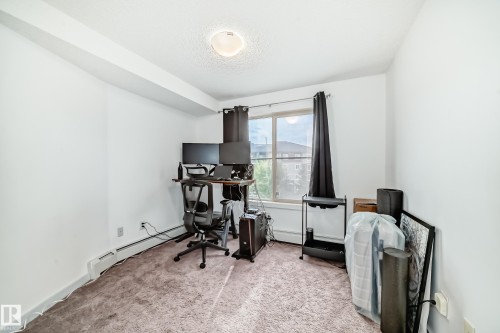 303 1070 Mcconachie Blvd, Edmonton, AB - Indoor Photo Showing Other Room